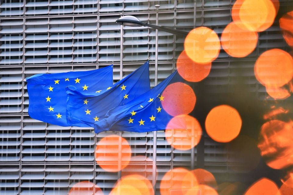 European Union flags fly outside the Berlaymont building, headquarters of the European Commission